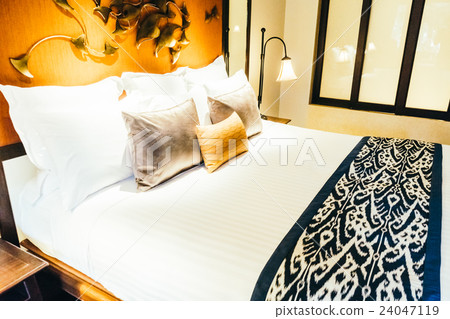 Pillow on bed 24047119