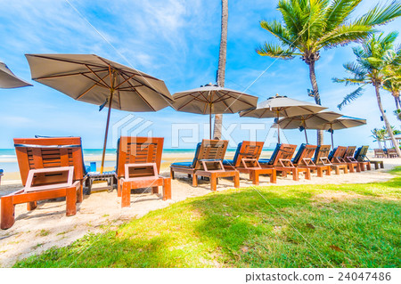Umbrella and chair Umbrella and chair 24047486