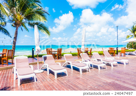 Umbrella and chair Umbrella and chair 24047497