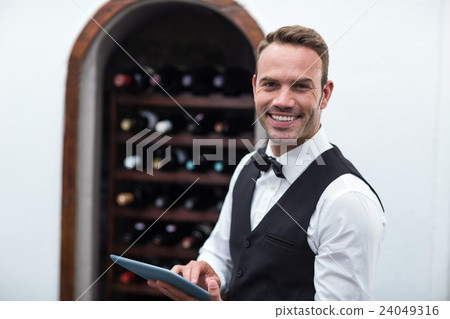 Waiter taking an order Waiter taking an order 24049316
