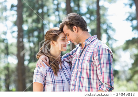 Young couple romancing during hiking Young couple romancing during hiking 24049818