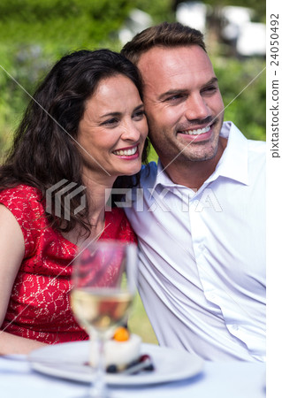 Happy young couple looking away 24050492