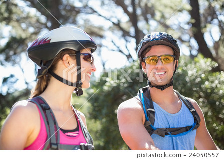 Smiling young couple at forest 24050557