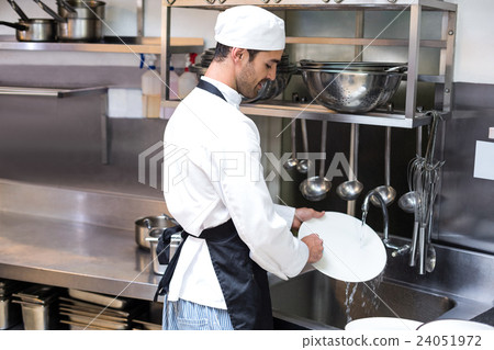 Handsome employee doing dishes 24051972