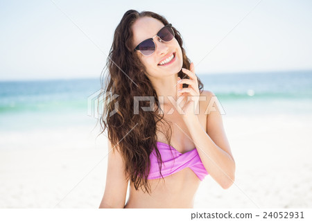 Portrait of smiling woman on the beach Portrait of smiling woman on the beach 24052931
