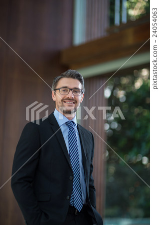Portrait of happy businessman Portrait of happy businessman 24054063
