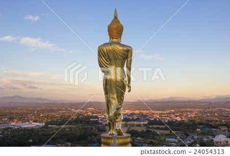 evening, golden buddha statue in Khao Noi temple 24054313