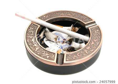 portrait and butts in ashtray with cigarette 24057999