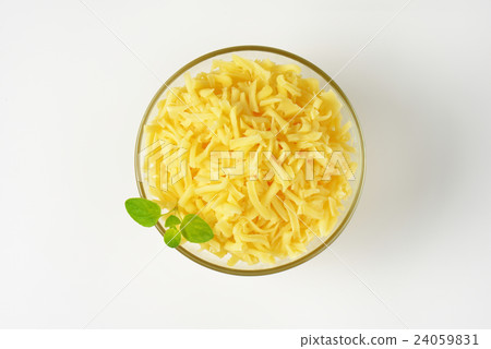 bowl of grated cheese bowl of grated cheese 24059831