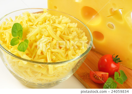 bowl of grated cheese 24059834