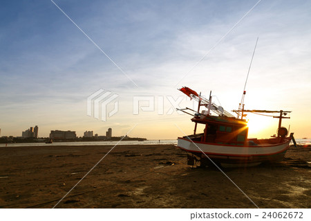 Sunsets and fishing boat 24062672