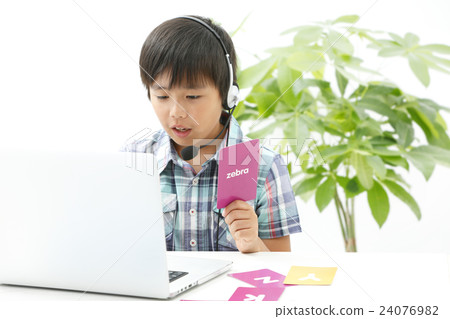 A boy studying English A boy studying English 24076982