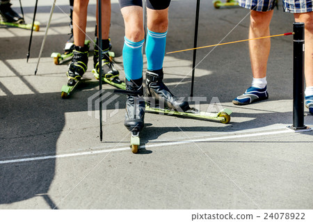 group of men athletes on ski-skaters 24078922