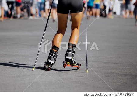 feet young female athlete in ski-roller 24078927