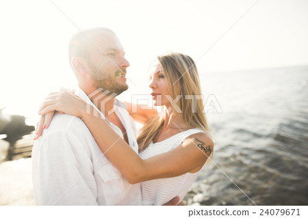 Happy romantic fashion couple in love have fun on Happy romantic fashion couple in love have fun on 24079671