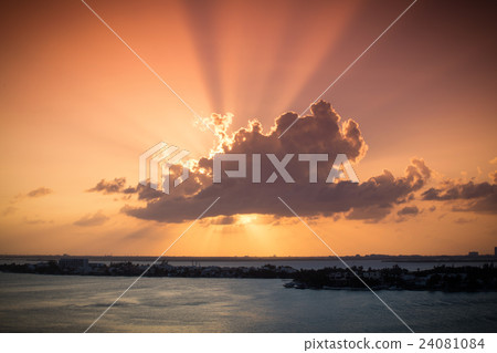 Sunset through clouds Sunset through clouds 24081084