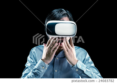 Men wearing VR goggles, virtual reality experience Men wearing VR goggles, virtual reality experience 24083782