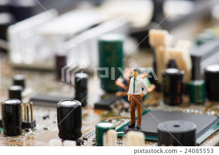 Computer base and miniature figures Computer base and miniature figures 24085553