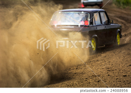 Autocross on a dusty road 24088956