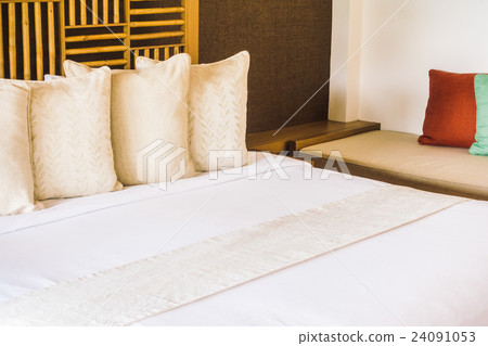 Pillow on bed 24091053