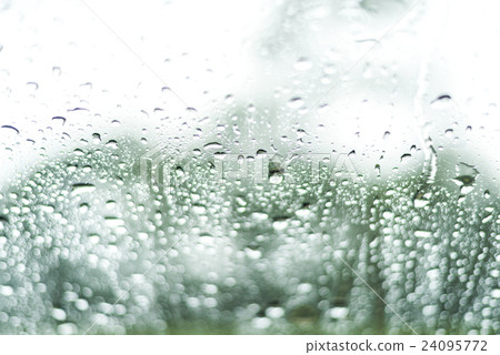 rain or water drops on a window glass 24095772