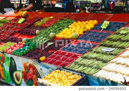 Fruits and vegetables lie on the counter 24099303