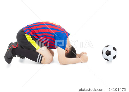 soccer player lose the game and kneel down 24101473