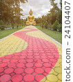Big Buddha statue In a green park. 24104407