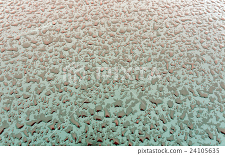 Water drops on green and red metal surface. 24105635