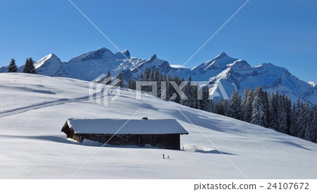 Idyllic winter landscape near Gstaad 24107672