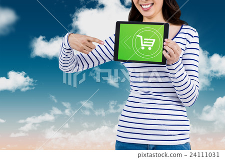 Composite image of mid section of woman pointing at tablet computer Composite image of mid section of woman pointing at tablet computer 24111031