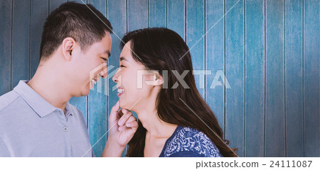 Composite image of loving man adoring happy woman 24111087