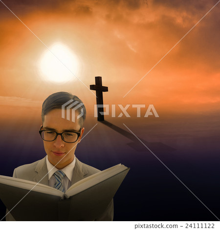 Composite image of geeky preacher reading from black bible Composite image of geeky preacher reading from black bible 24111122