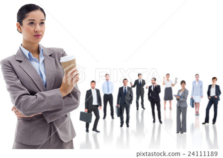 Composite image of portrait of a cute businesswoman holding a takeaway tea 24111189