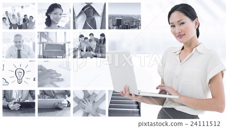 Composite image of asian businesswoman using laptop 24111512