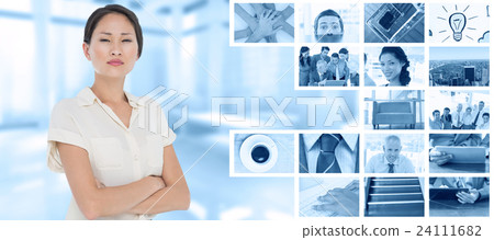 Composite image of business colleagues with arms crossed in office Composite image of business colleagues with arms crossed in office 24111682