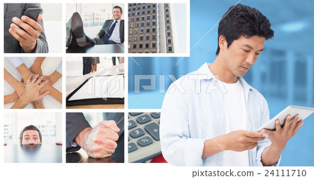 Composite image of male looking at his tablet computer 24111710