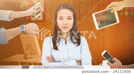 Composite image of hands holding devices 24111936