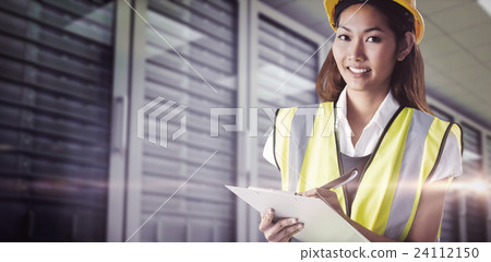 Composite image of architect woman with yellow helmet and plans 24112150