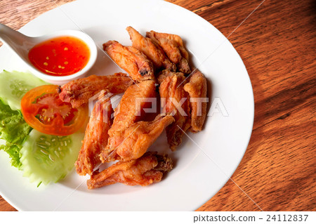 Fried chicken wings with sauce Fried chicken wings with sauce 24112837