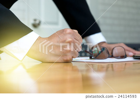 businessman smashed his hand on table 24114593