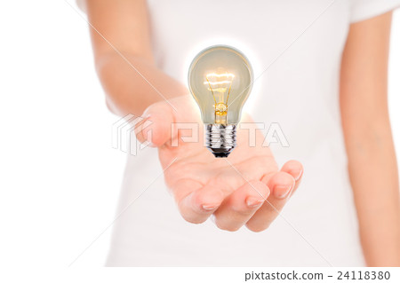 women hand with Light bulb . 24118380