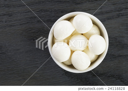 small balls of mozzarella in bowl small balls of mozzarella in bowl 24118828