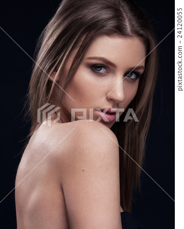 Beautiful woman on black background 24120055