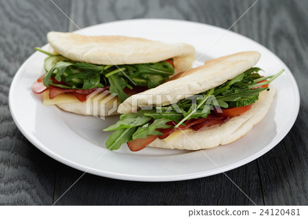 rustic sandwiches with ham arugula and tomatoes rustic sandwiches with ham arugula and tomatoes 24120481