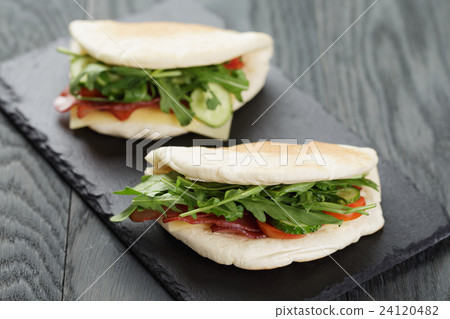 rustic sandwiches with ham arugula and tomatoes rustic sandwiches with ham arugula and tomatoes 24120482