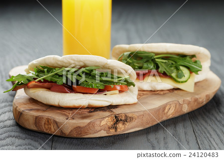 rustic sandwiches with ham arugula and tomatoes rustic sandwiches with ham arugula and tomatoes 24120483