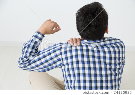Young man holding shoulder stiff shoulder stiff white back Young man holding shoulder stiff shoulder stiff white back 24120983