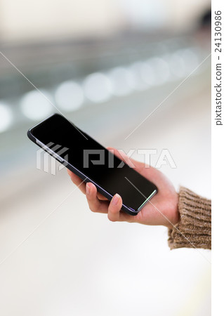 Woman use of mobile phone 24130986