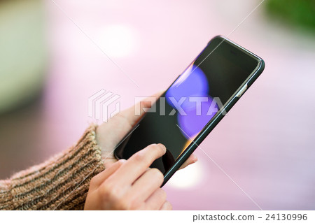 Woman use of cellphone Woman use of cellphone 24130996